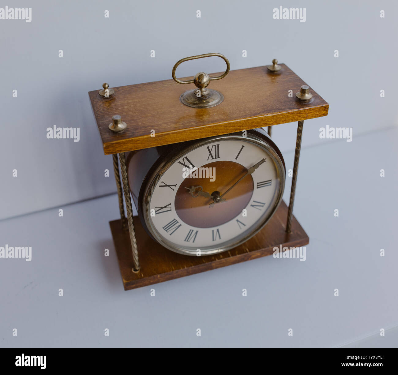 Old soviet table clock with mechanical winding Stock Photo