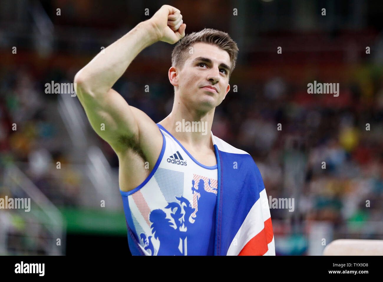 Great Britain's Max Whitlock celebrates his gold medal in the Men's