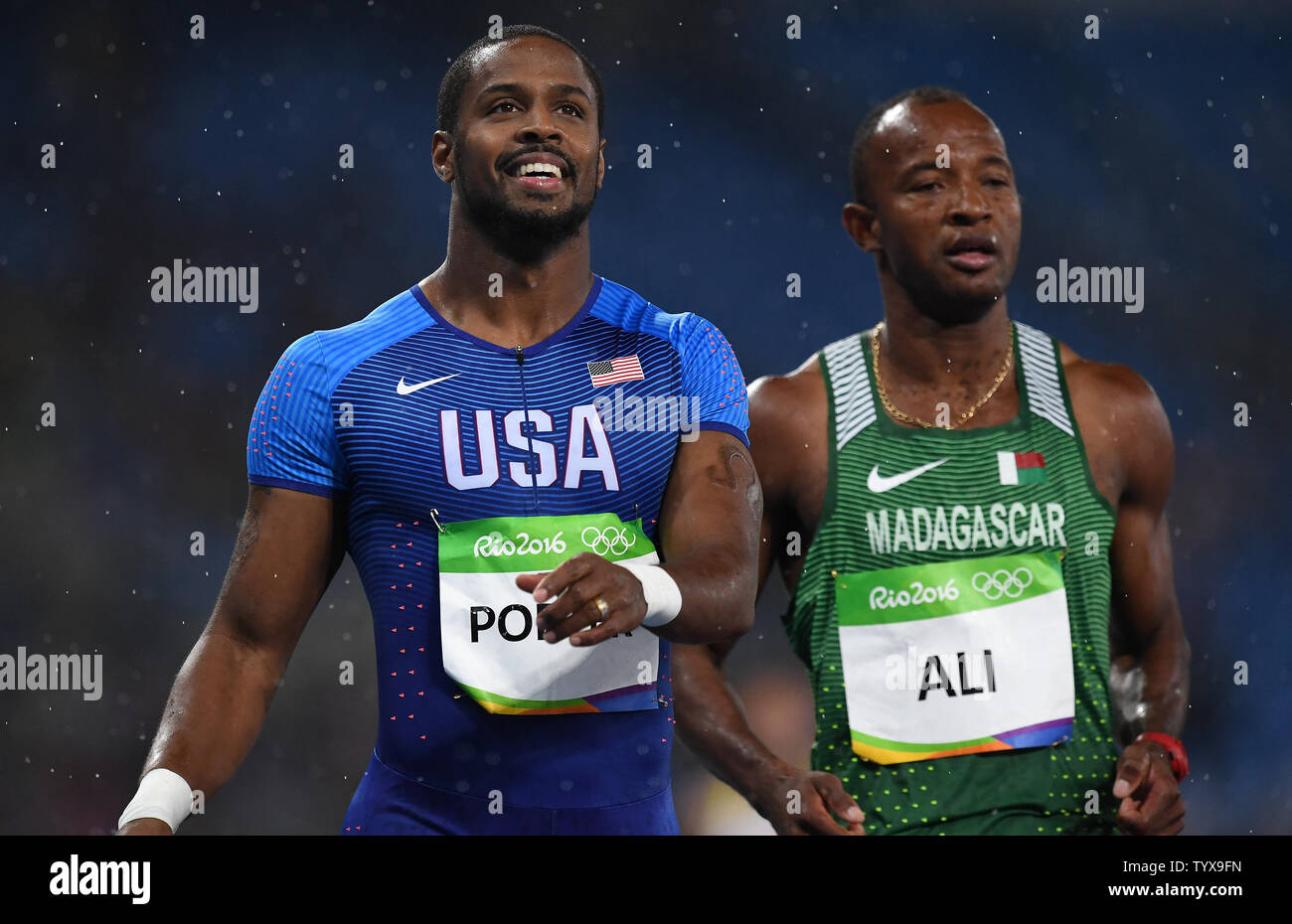 Jeff Porter (USA) finishes ahead of Kame Ali (MAD) during a Men's 110m