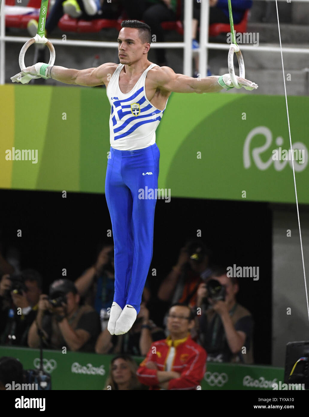 Greece's Eleftherios Petrounias goes through his routine on the Rings during the Men's Rings Final at the 2016 Rio Summer Olympics in Rio de Janeiro, Brazil, August 15, 2016. Petrounias won the Gold Medal, Brazil's Arthur Zanetti won the Silver and Russia's Denis Abliazin won the Bronze.       Photo by Mike Theiler/UPI Stock Photo