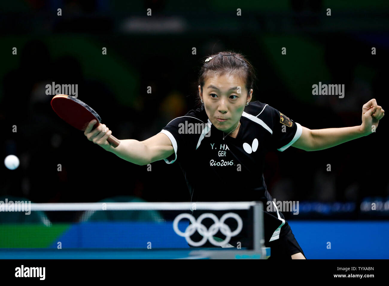 GermanyÕs Ying Han fires off a return in the Women's Team Table Tennis gold medal match against ChinaÕs Xiaoxia Li in Riocentro Pavilion 3 at the 2016 Rio Summer Olympics in Rio de Janeiro, Brazil, on August 16, 2016.   Photo by Matthew Healey/UPI Stock Photo