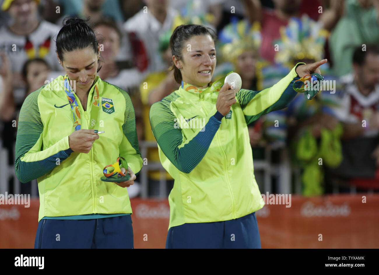 Agatha Bednarczuk Rippel and Barbara Seixas de Freitas of Brazil celebrate after winning the silver medal in the Beach Volleyball Women's match at the Beach Volleyball Arena at the 2016 Rio Summer Olympics in Rio de Janeiro, Brazil, on August 17, 2016.      Photo by Matthew Healey/UPI Stock Photo