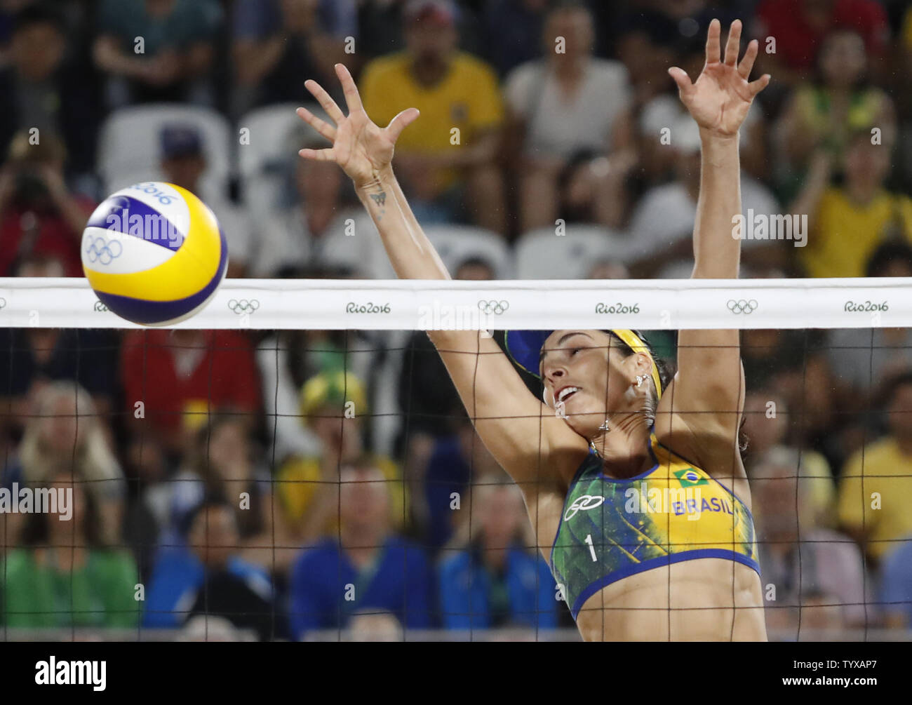 Silver medalists Agatha Bednarczuk Rippel of Brazil competes in their match against Germany in the Women's Beach Volleybal at the Beach Volleyball Arena at the 2016 Rio Summer Olympics in Rio de Janeiro, Brazil, on August 17, 2016.      Photo by Matthew Healey/UPI Stock Photo