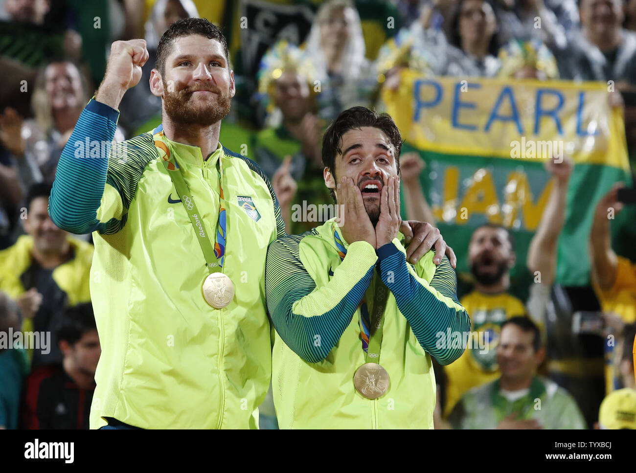 Alison Cerutti and Bruno Schmidt Oscar of Brazil celebrate after