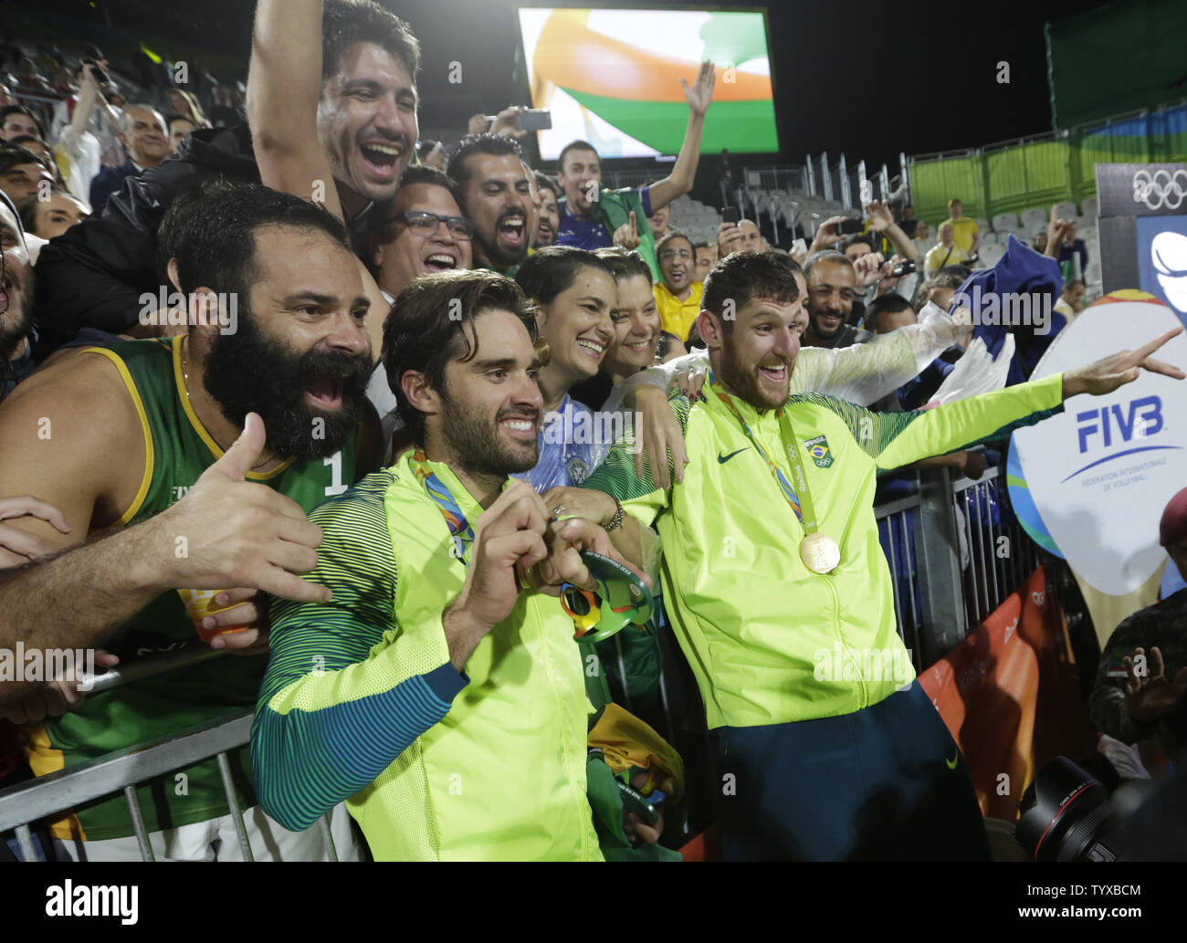 Alison Cerutti and Bruno Schmidt Oscar of Brazil celebrate after
