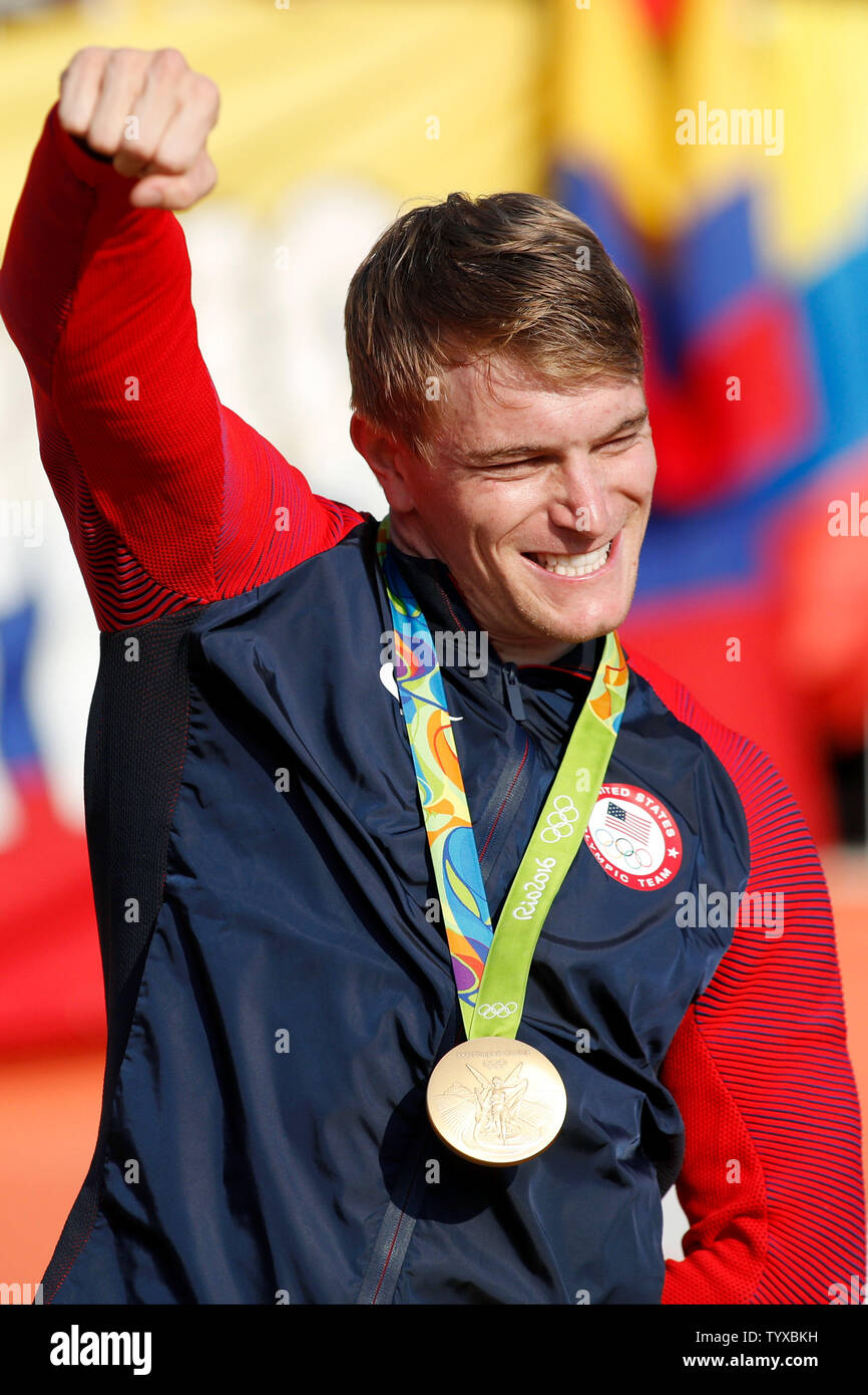 USA's Connor Fields pumps his fist after receiving his gold medal for