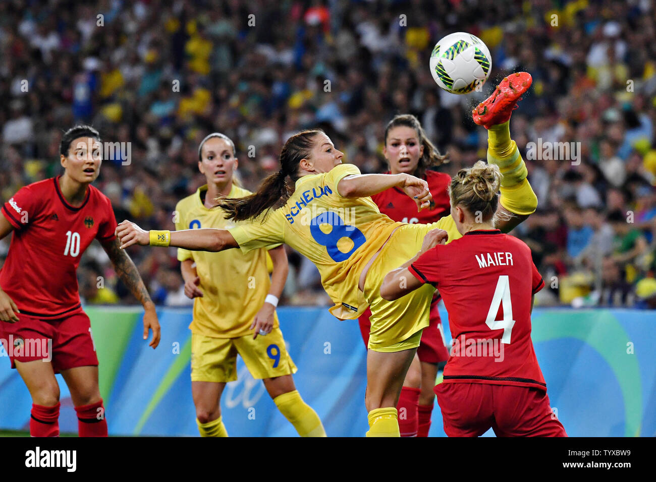 Lotta Schelin (8) of Sweden high kicks the ball away from Leonie Maier (4) of Germany during play in the Women's Football gold medal match in the Maracana Stadium at the 2016 Rio Summer Olympics in Rio de Janeiro, Brazil, on August 19, 2016. Germany won the gold medal 2-1 and Sweden the silver.        Photo by Richard Ellis/UPI Stock Photo