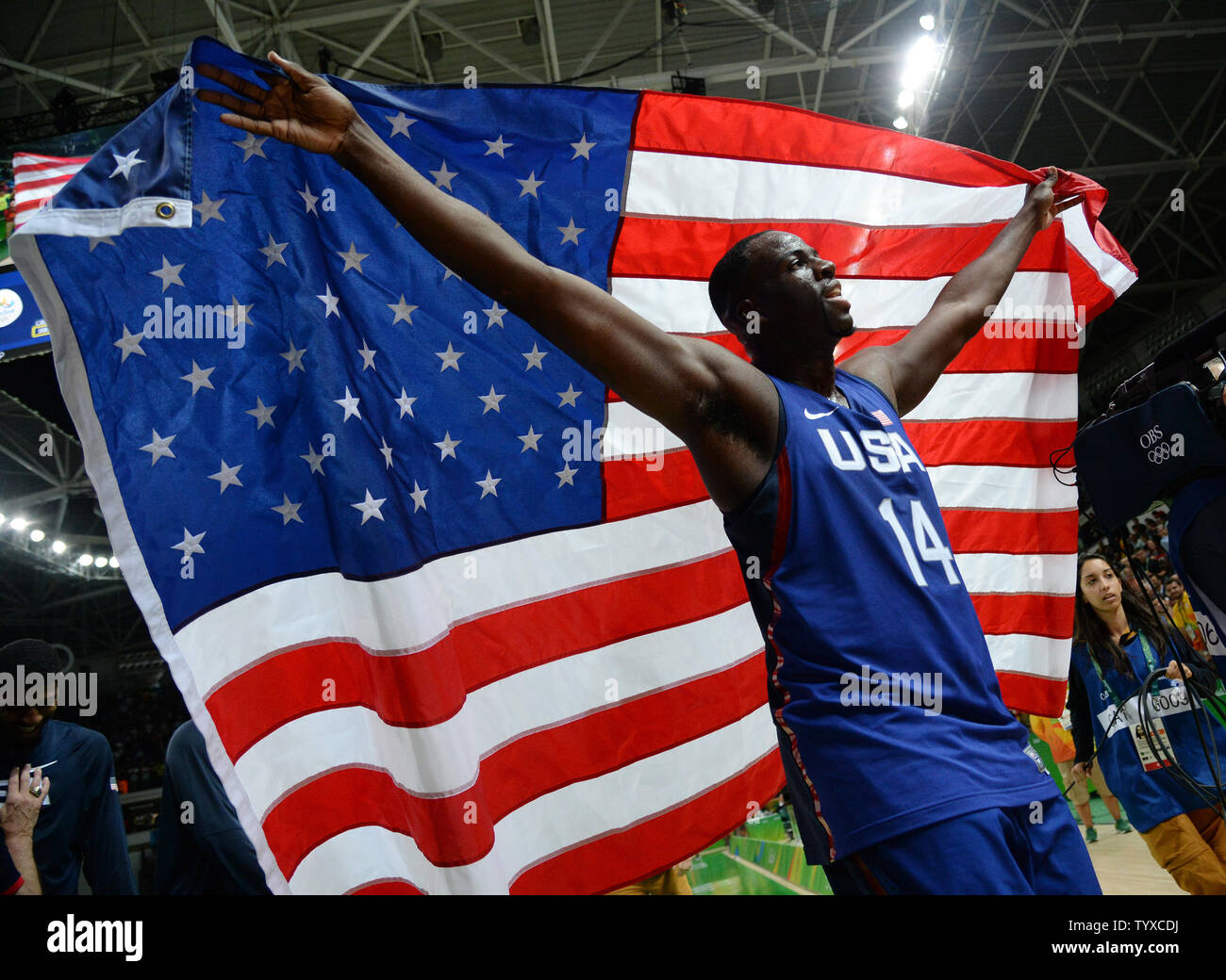 Draymond Green of the United States celebrates after the game against Serbia in the Men's Basketball gold medal game between Serbia and the United States at Carioca Arena 1 at the 2016 Rio Summer Olympics in Rio de Janeiro, Brazil, on August 21, 2016. The United States defeated Serbia 96-66 to win its third consecutive gold medal.  Photo by Kevin Dietsch/UPI Stock Photo