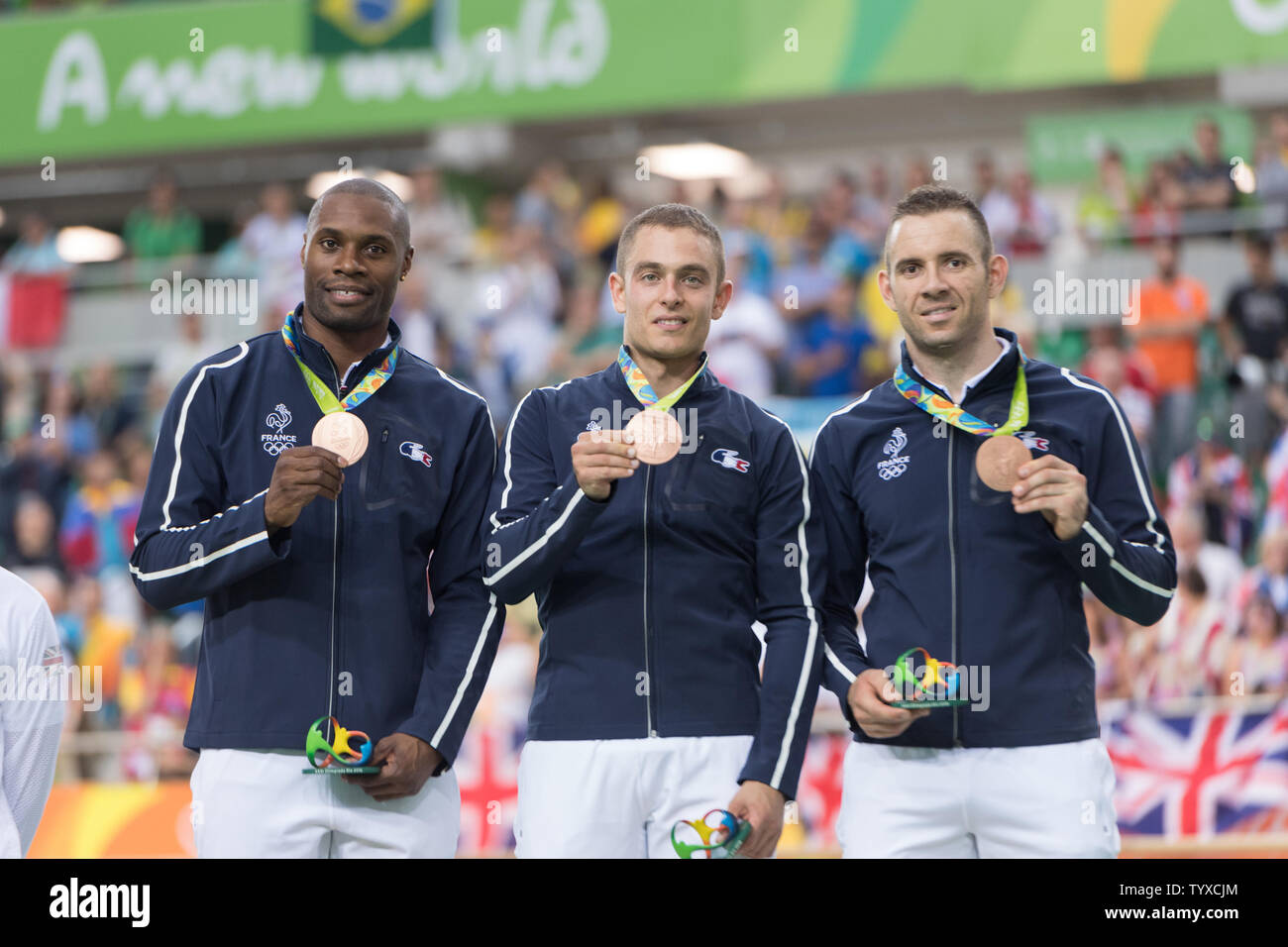 Cyclists Gregory Bauge, Michael D'Almeida and Francois Pervis of France show their Bronze medals following the presentation ceremony for the Men's Team Sprint Finals at the Rio Olympic Velodrome during the 2016 Summer Olympics in Rio de Janeiro, Brazil, on August 11, 2016. France won the bronze, New Zealand the silver and Great Britain the gold.   Photo by Richard Ellis/UPI Stock Photo