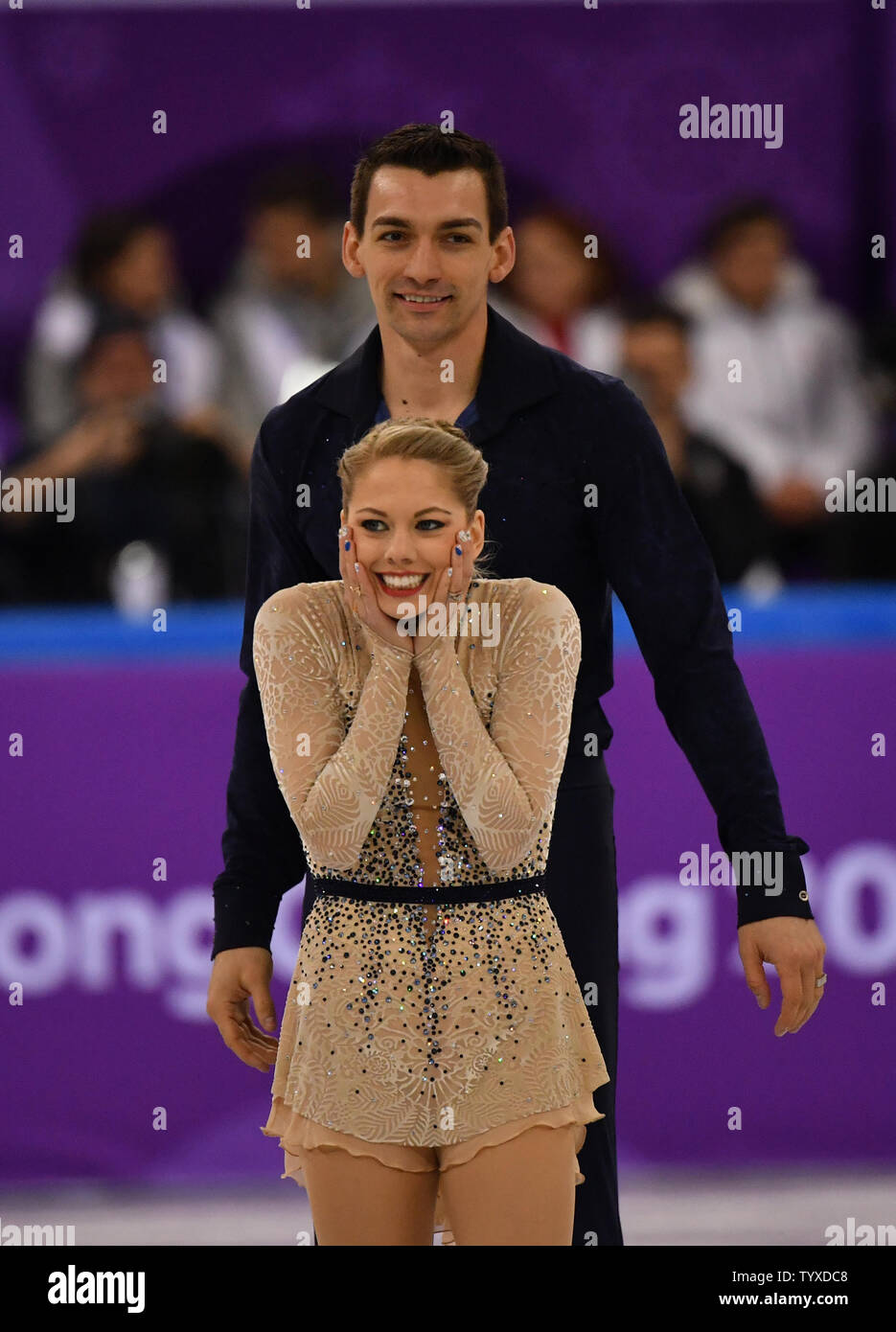 Figure skaters Alexa Scimeca Knierim and Chris Knierim of the USA react  after their set in Pair Skating Short Program during the 2018 Pyeongchang  Winter Olympics at the Gangneung Ice Arena in