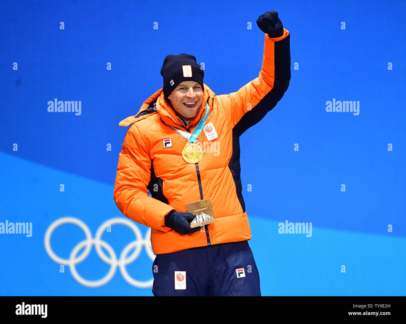 Sven Kramer of the Netherlands (gold) celebrates his medal in men's 5000  meter speed skating during a Medal Ceremony at BC Place in Vancouver,  Canada, during the 2010 Winter Olympics on February