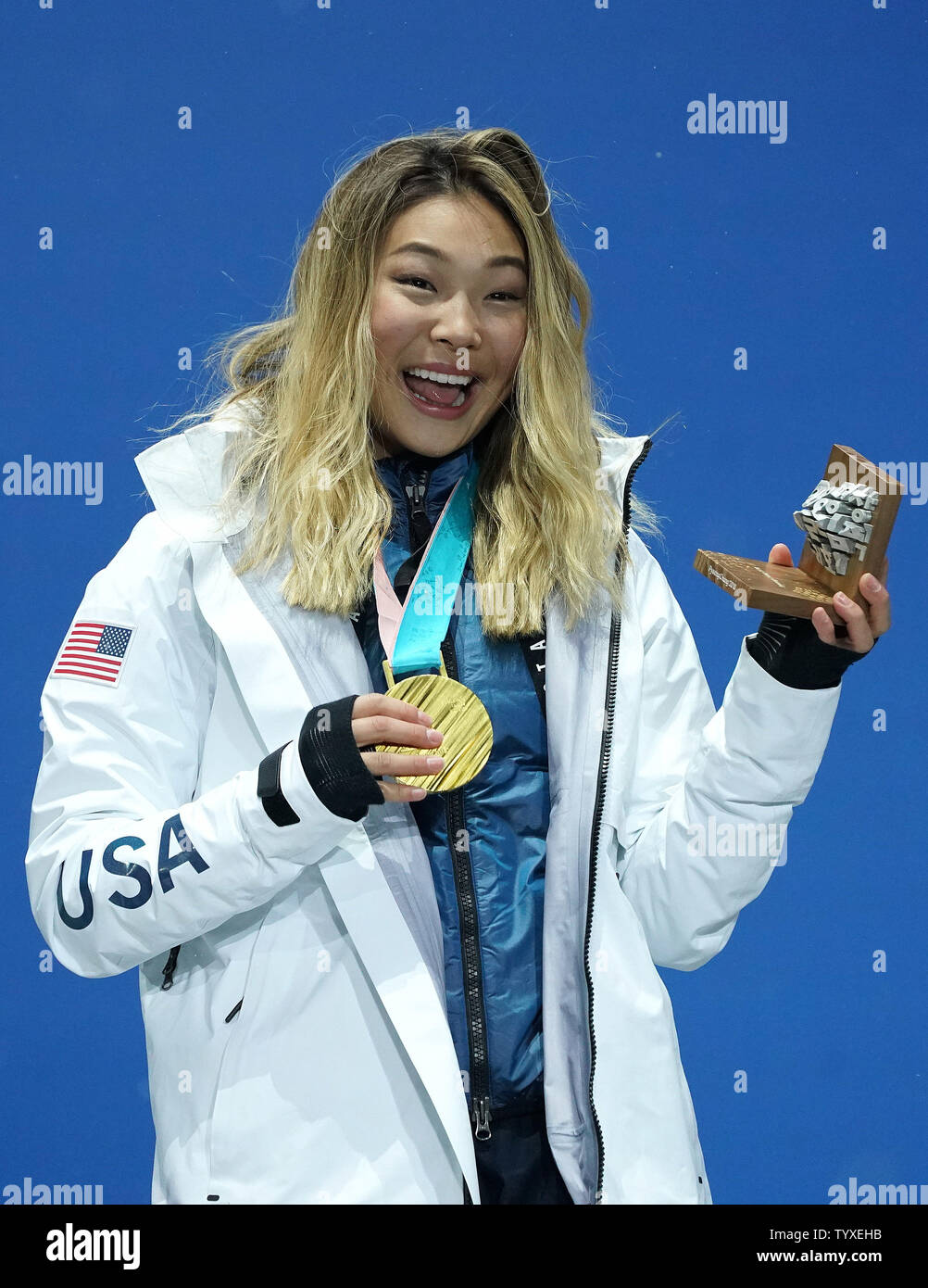 Gold medalist American Chloe Kim celebrates during the medal ceremony