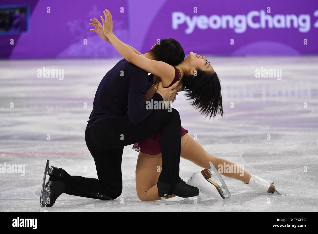 Wenjing Sui and Cong Han of China compete in the Pairs Figure Skating