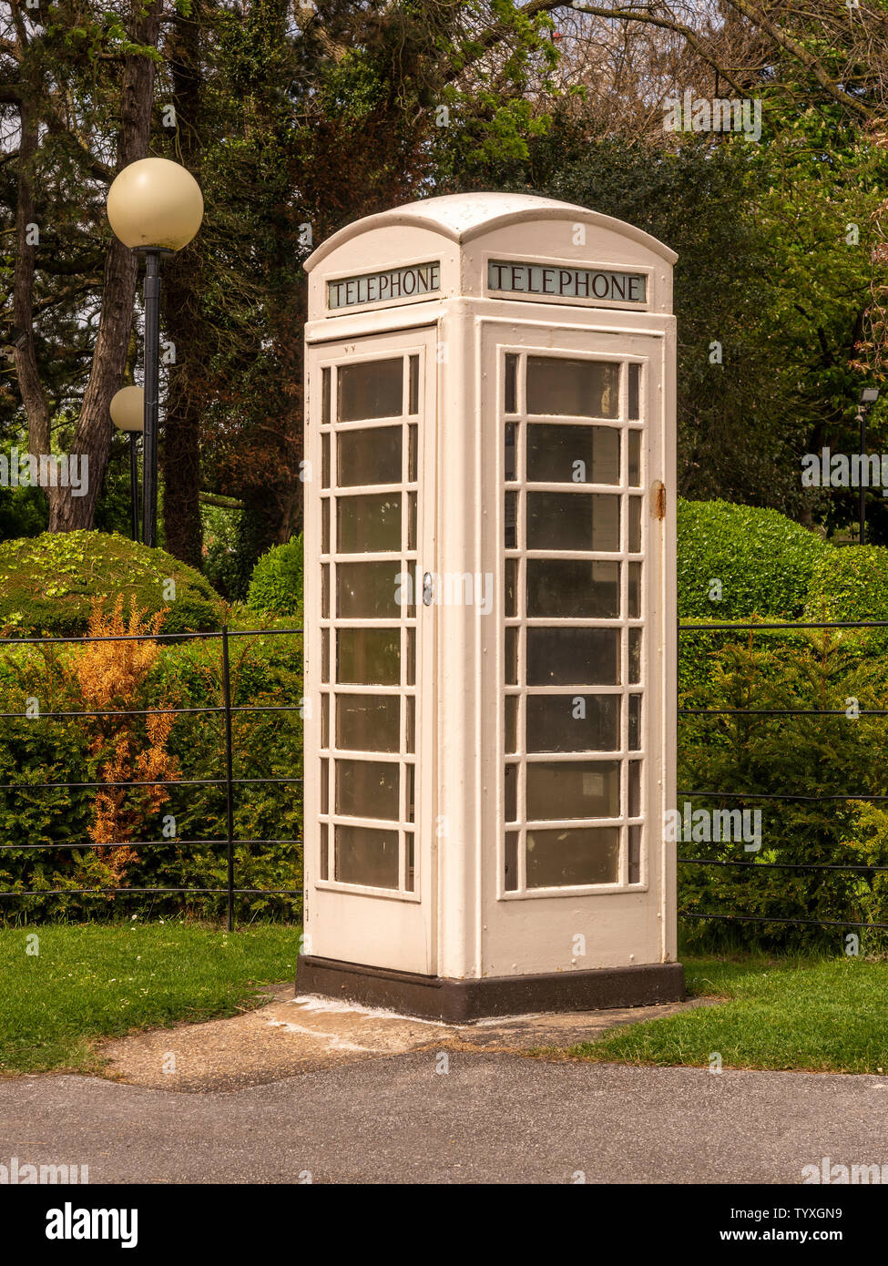 One of Hull's distinctive cream or white telephone boxes. Stock Photo