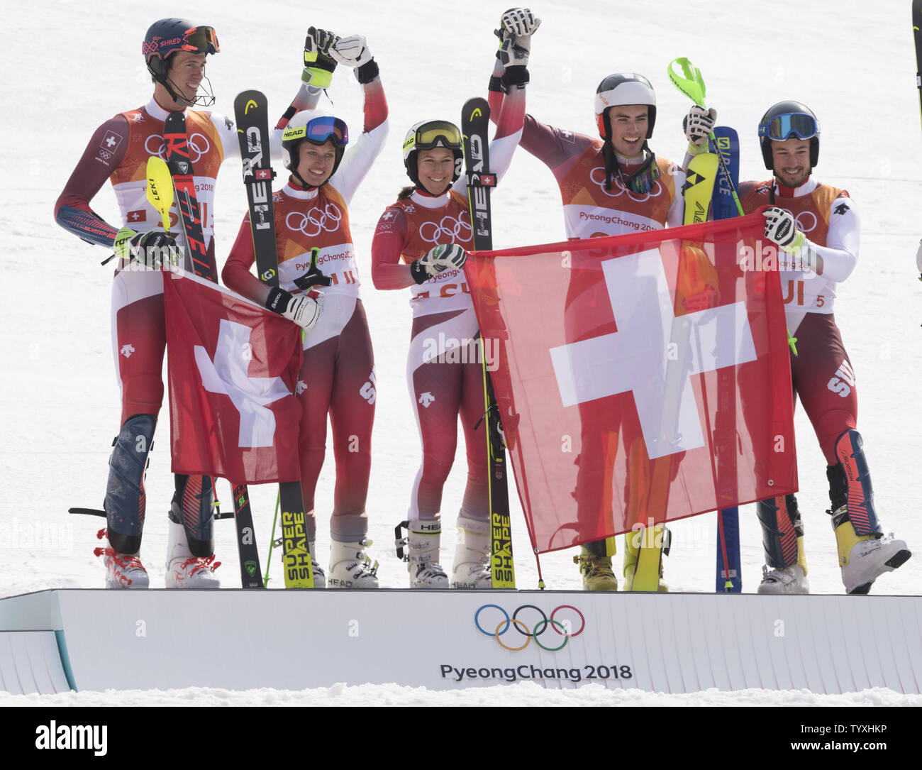 Switzerland's Daniel Yule, Wendy Holdener, Ramon Zenhaeusern and Denise Feierabend celebrate after winning gold in the Alpine Team Event Final at the Pyeongchang 2018 Winter Olympics in Pyeongchang, South Korea, on February 24, 2018. Photo by Kevin Dietsch/UPI Stock Photo