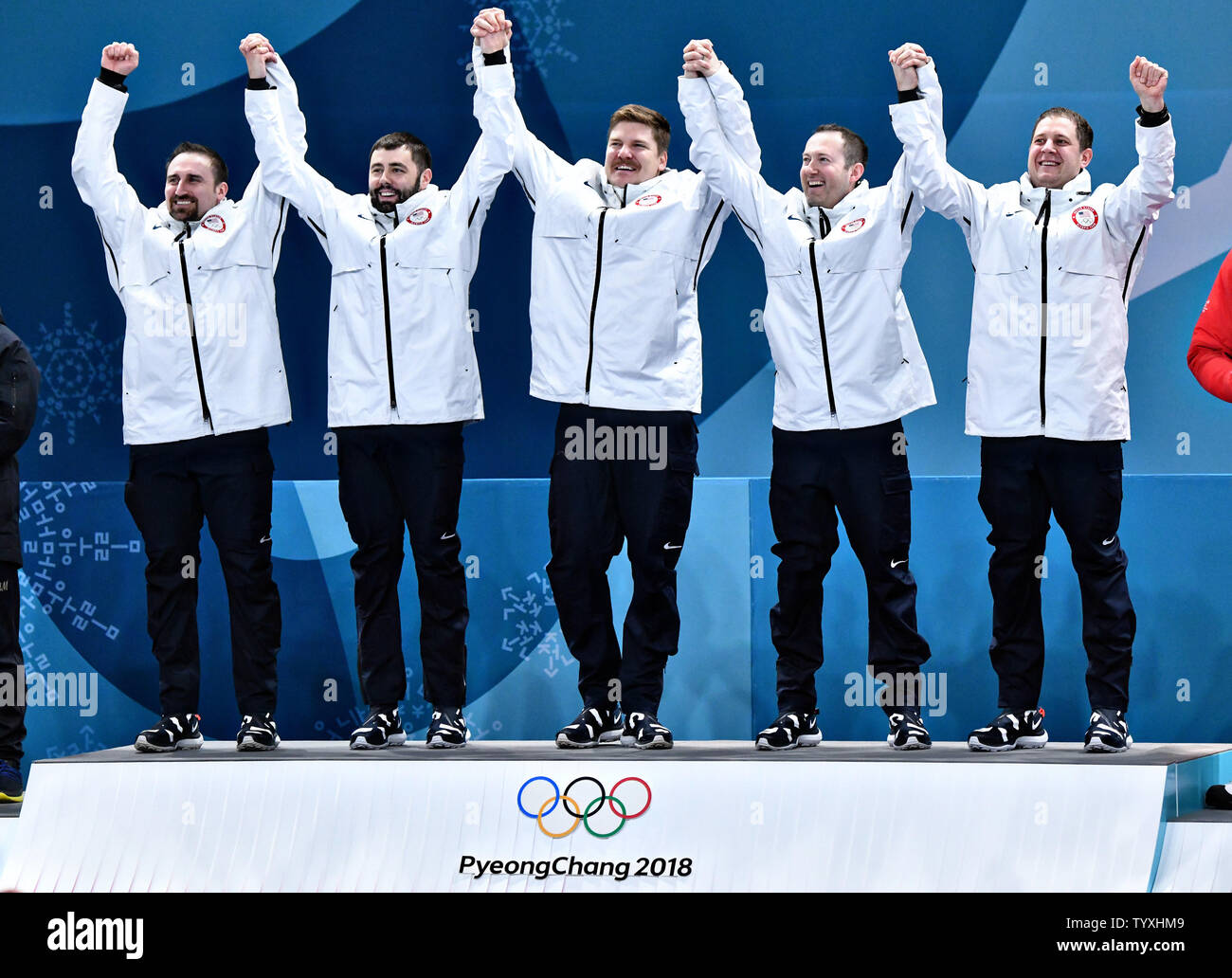 The United States Men S Curling Team Celebrates Their Gold Medal Win During The Medal Ceremony For Men S Curling At The Pyeongchang 18 Winter Olympics In The Gangneung Curling Centre In Gangneung South