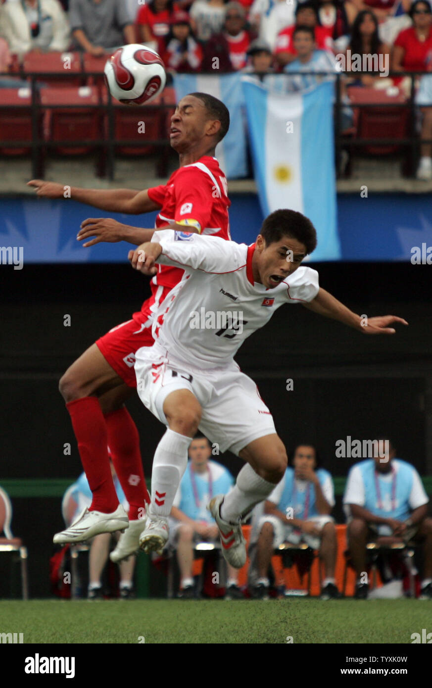 North Korean defender Yong Il Yun (15) tangles with Panama's forward Gabriel Torres during the second half of the opening FIFA Under-20 World Cup match at Frank Clair Stadium in Ottawa, Canada on June 30, 2007. The match ended in a scoreless tie. (UPI Photo/Grace Chiu). Stock Photo
