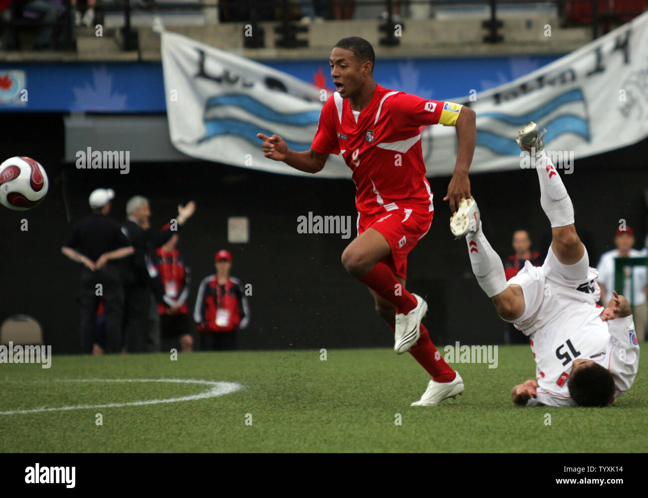 Panama's forward Gabriel Torres (red) pursues the ball after scrimmaging with North Korean defender Yong Il Yun (15) during the second half of the opening FIFA Under-20 World Cup match at Frank Clair Stadium in Ottawa, Canada on June 30, 2007. The match ended in a scoreless tie. (UPI Photo/Grace Chiu). Stock Photo