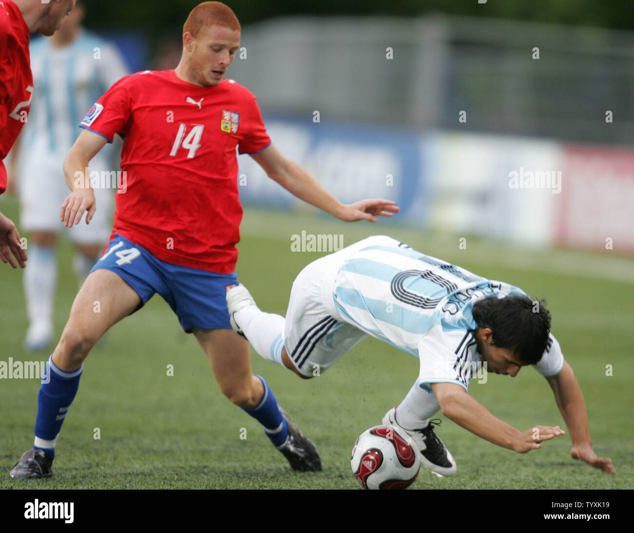 Czech Republic's midfielder Marcel Gecov (L) trips Argentina's forward Sergio Aguero during the first half of the FIFA Under-20 World Cup match at Frank Clair Stadium in Ottawa, Canada on June 30, 2007. The match ended in a scoreless tie. (UPI Photo/Grace Chiu). Stock Photo