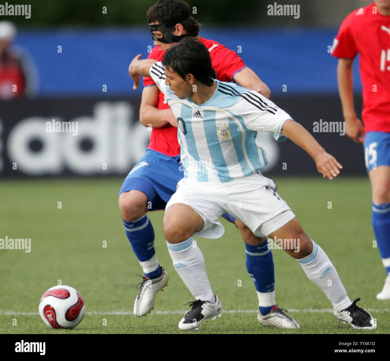 Argentina's forward Sergio Aguero (R) pushes off against Czech Republic defenseman Marek Suchy  during the first half of the FIFA Under-20 World Cup match at Frank Clair Stadium in Ottawa, Canada on June 30, 2007. The match ended in a scoreless tie. (UPI Photo/Grace Chiu). Stock Photo