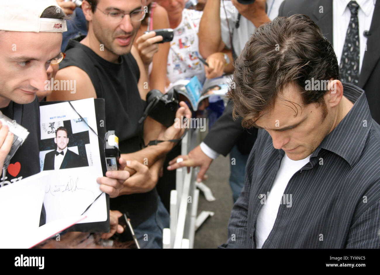 Actor Matt Dillon signs autographs for fans while promoting his new