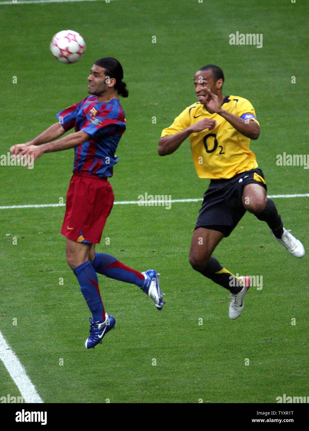 Fc Barcelona Eafael Marquez And Arsenal Fc Thierry Henry (R) Fight For The  Ball During Their Uefa Champions League Soccer Final At The Stade De France  In Saint Denis, Near Paris, May