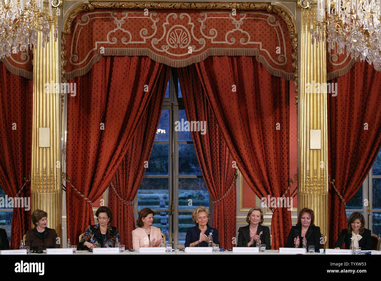 (L to R) U.S. First Lady Laura Bush, wife of the Egyptian president Suzanne Mubarak, Queen Silvia of Sweden; wife of the French president Bernadette Chirac, Belgium Queen Paola, and wife of the Russian president Liudmila Putin attend a conference at the Elysee Palace in Paris, January 17, 2007. The First Ladies met to form a committee for the defense of lost or exploited children. (UPI Photo/Eco Clement) Stock Photo