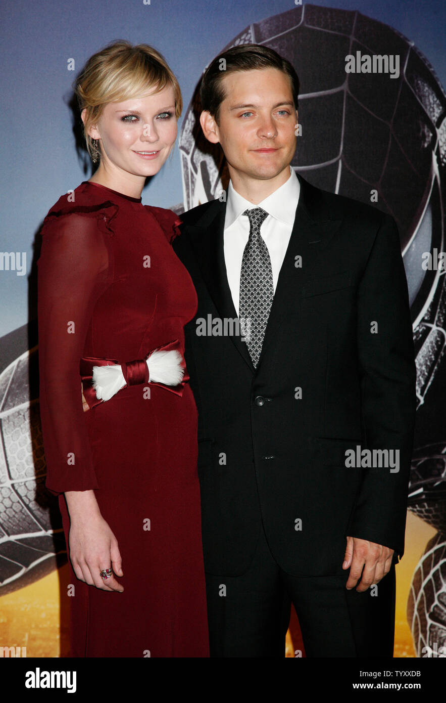 Actress Kirsten Dunst and actor Tobey Maguire arrive for the French