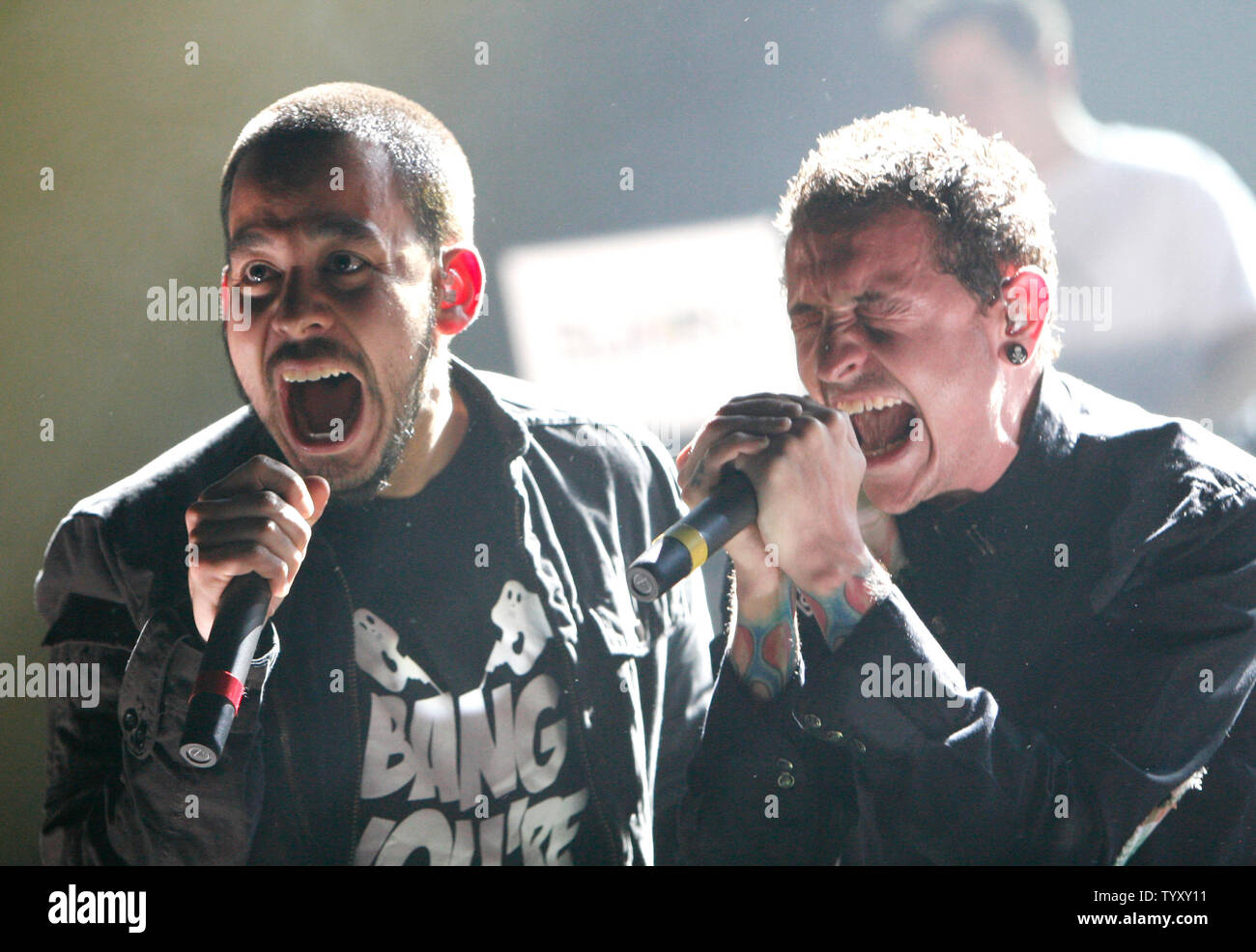 Mike Shinoda (L) and Chester Bennington of the band Linkin Park perform in concert at Bercy in Paris on May 30, 2007.   (UPI Photo/David Silpa) Stock Photo