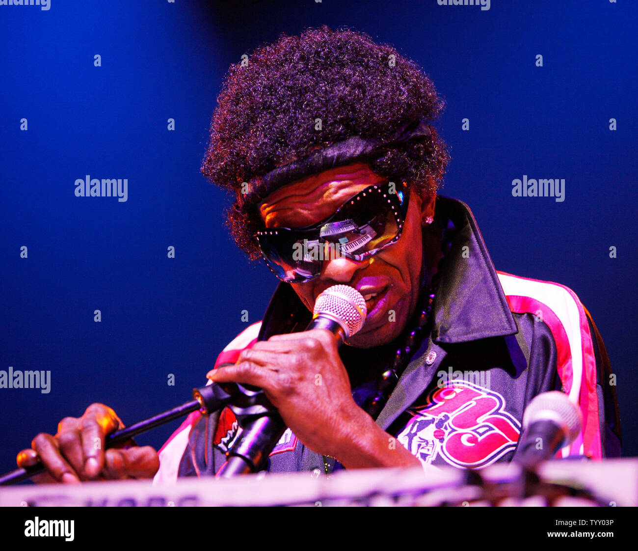 Sly Stone, frontman of the group Sly and the Family Stone, performs in