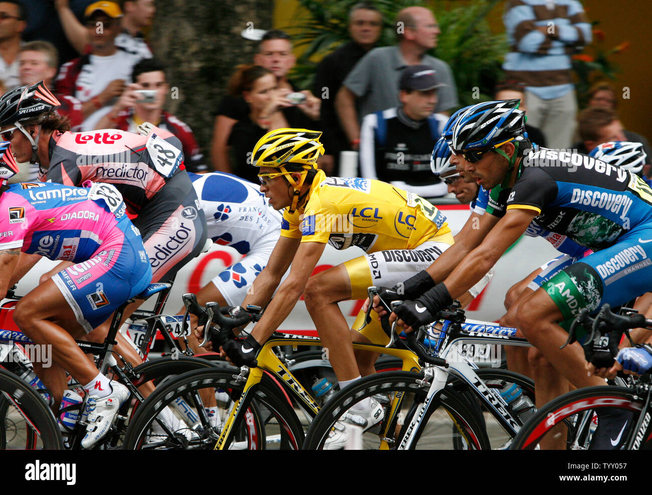 Spaniard Alberto Contador (yellow jersey) is protected by his Discovery Channel teammates during the final stage of the Tour de France in Paris on July 29, 2007.   Contador went on to win this year's Tour, becoming the first Spaniard since Miguel Indurain in 1995 to do so.   (UPI Photo/ David Silpa) Stock Photo