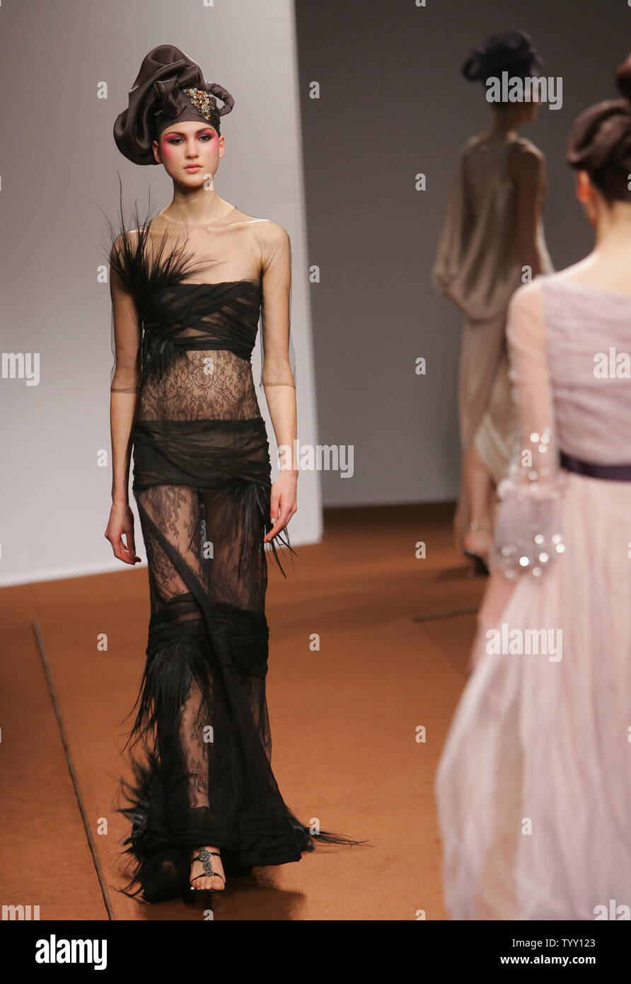 A model wears an outfit by French fashion designer Christophe Josse ...