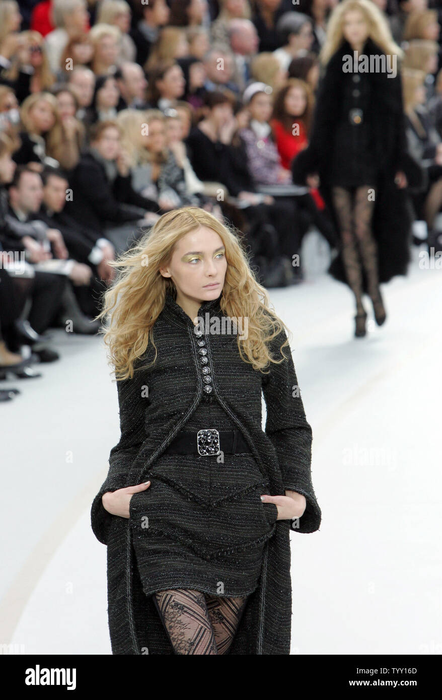 A model displays a creation by German fashion designer Karl