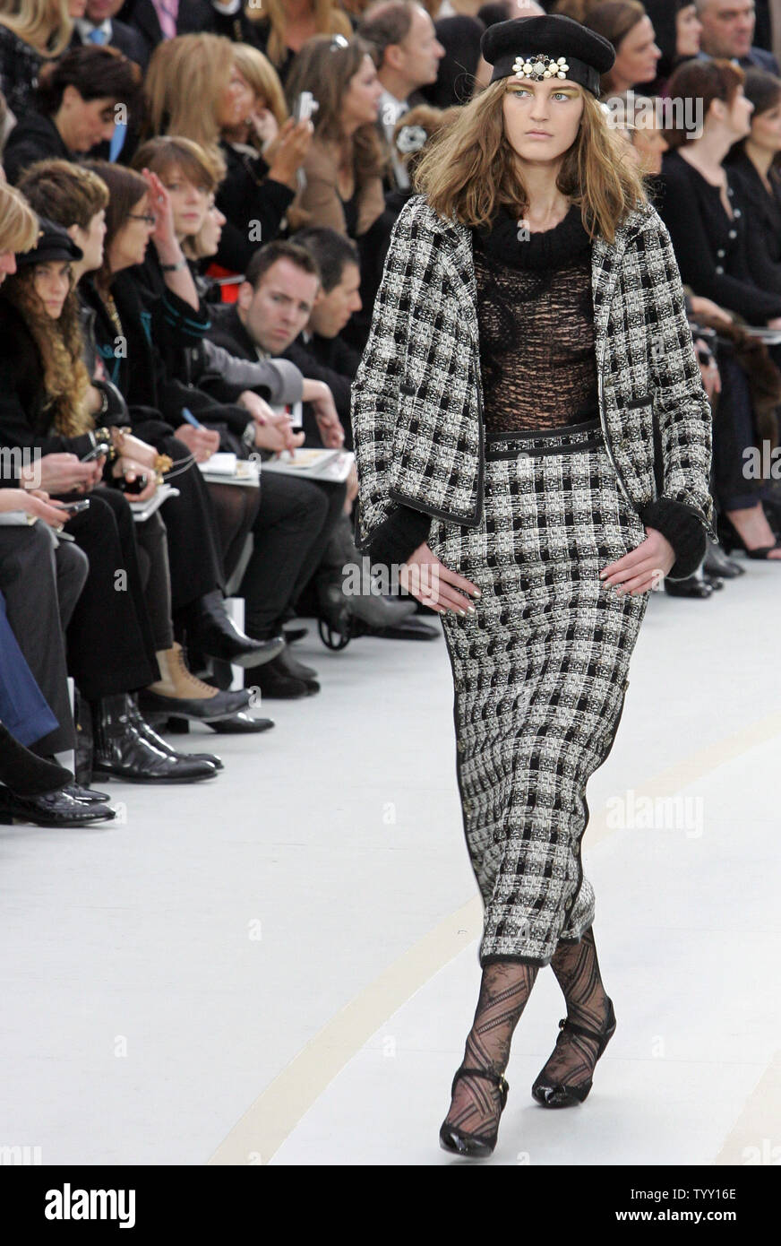 A model wears an outfit by German fashion designer Karl Lagerfeld  for Chanel at the Fall-Winter 2008/2009 ready-to-wear Paris Fashion Week, February 29, 2008. (UPI Photo) Stock Photo