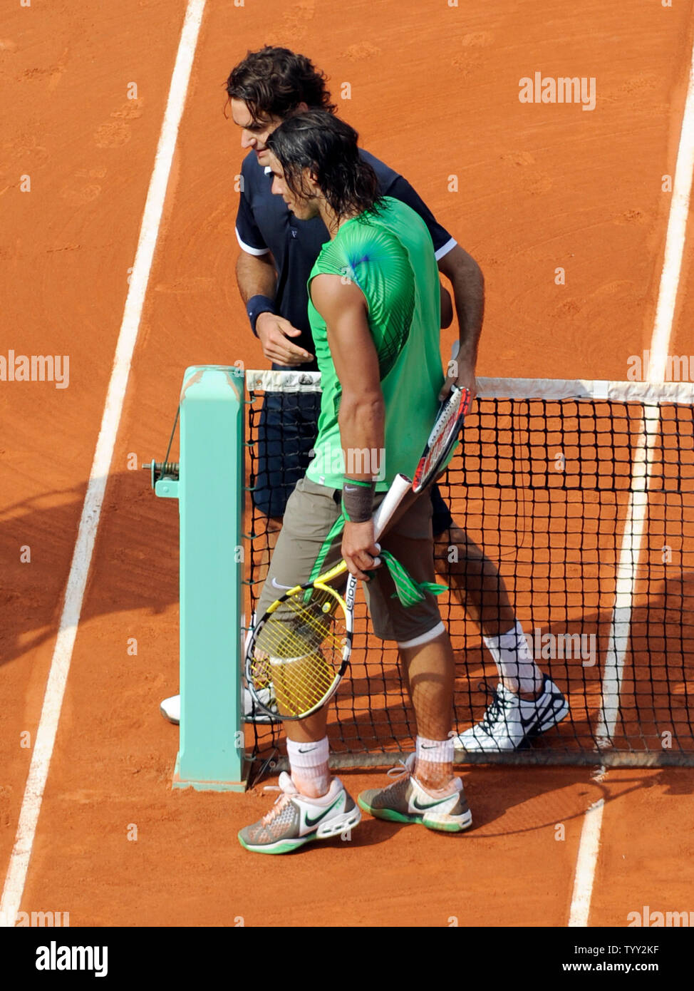 Rafael Nadal of Spain and Roger Federer of Switzerland shake hands at the  end of their final match at the French Open tennis tournament in Paris,  June 8, 2008. Nadal won the