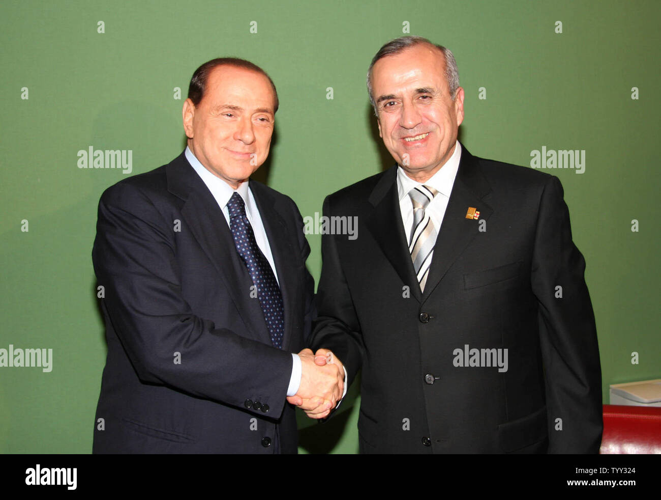 Lebanon's recently elected President, Michel Suleiman (R) is greeted by Italian Prime Minister Silvio Berlusconi during the Mediterranean Summit in Paris on July 13, 2008.  Forty-three nations from the Mediterranean, including Israel and Arab States, are attending the summit; one of the major topics being discussed is to create a weapon of mass destruction free zone in the Mediterranean. (UPI Photo/Dalati & Nohra) Stock Photo