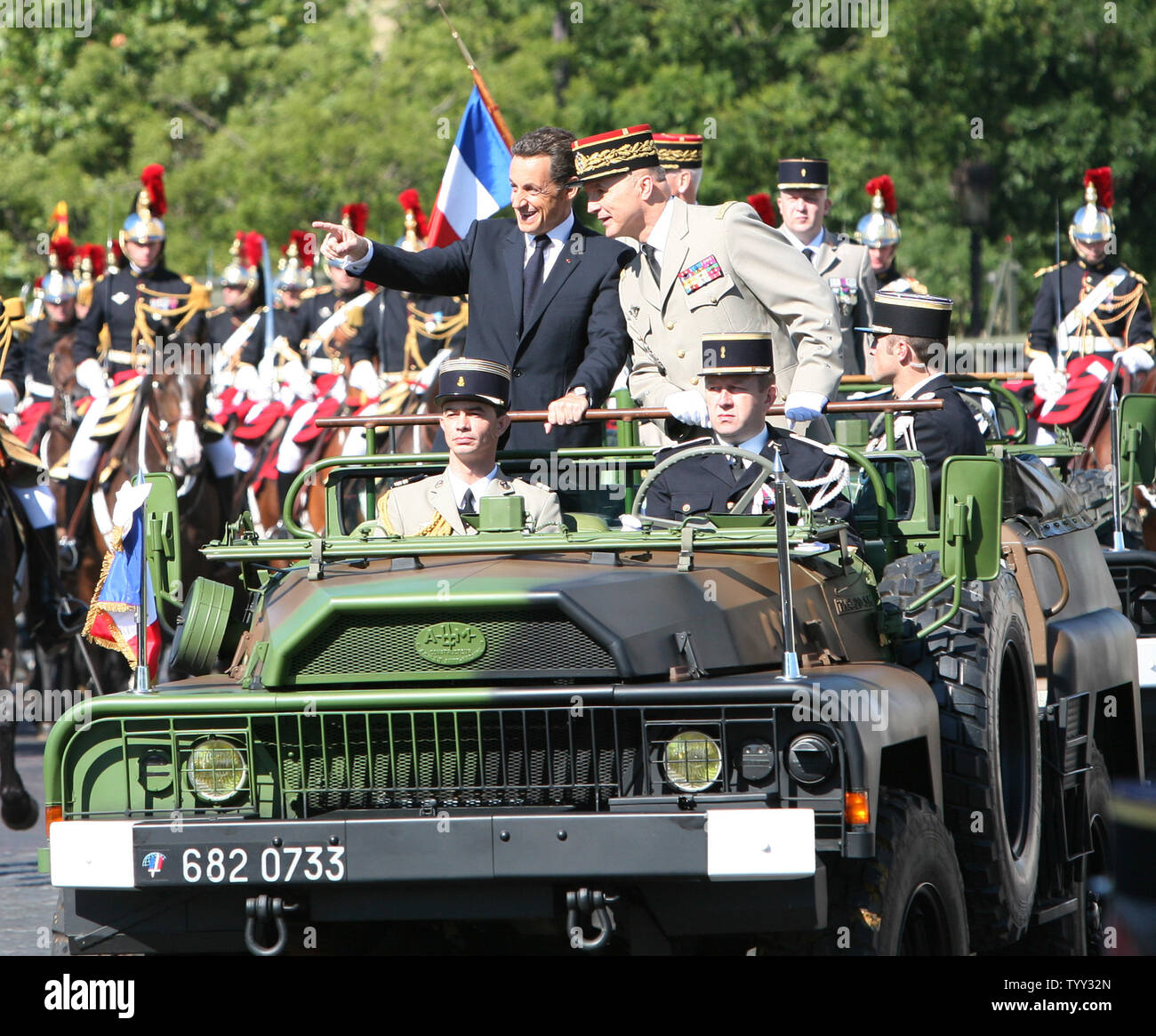 French President Nicolas Sarkozy (left) and French Army Chief of Staff General Jean Louis Georgelin ride down the Avenue des Champs-Elysees during the annual Bastille Day in Paris on July 14, 2008.   (UPI Photo/ David Silpa) Stock Photo