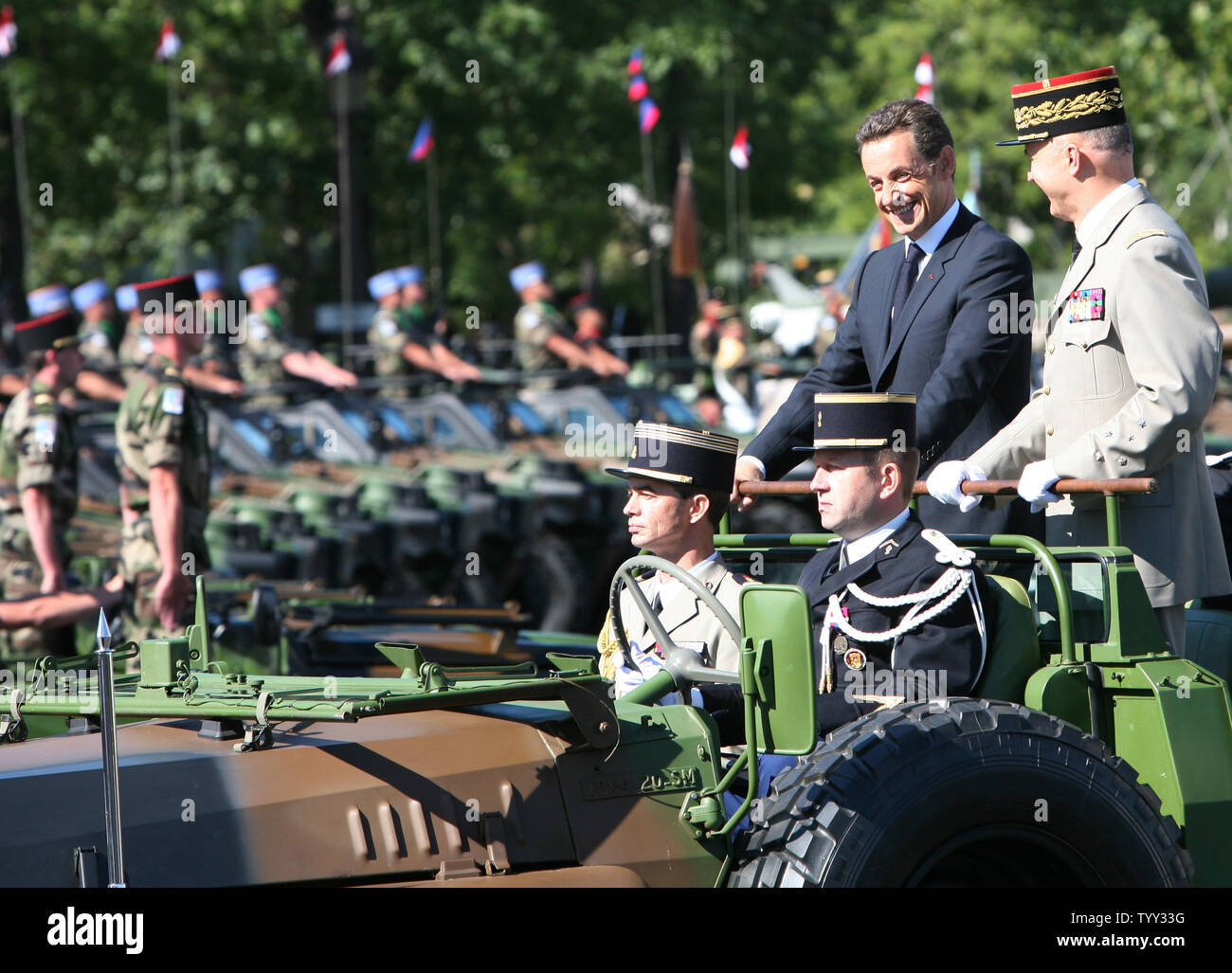 French President Nicolas Sarkozy (left) and French Army Chief of Staff General Jean Louis Georgelin ride down the Avenue des Champs-Elysees during the annual Bastille Day in Paris on July 14, 2008.   (UPI Photo/ David Silpa) Stock Photo