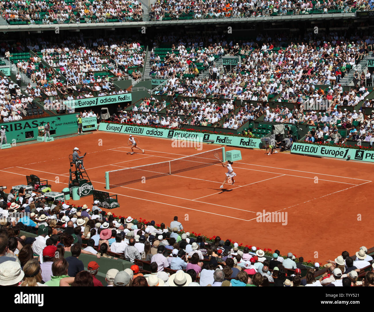 Virginie Razzano of France hits a shot during her French Open third-round match against Tathiana Garbin of Italy at Roland Garros in Paris on May 30, 2009.  Razzano defeated Garbin 7-5, 7-5.   (UPI Photo/ David Silpa) Stock Photo