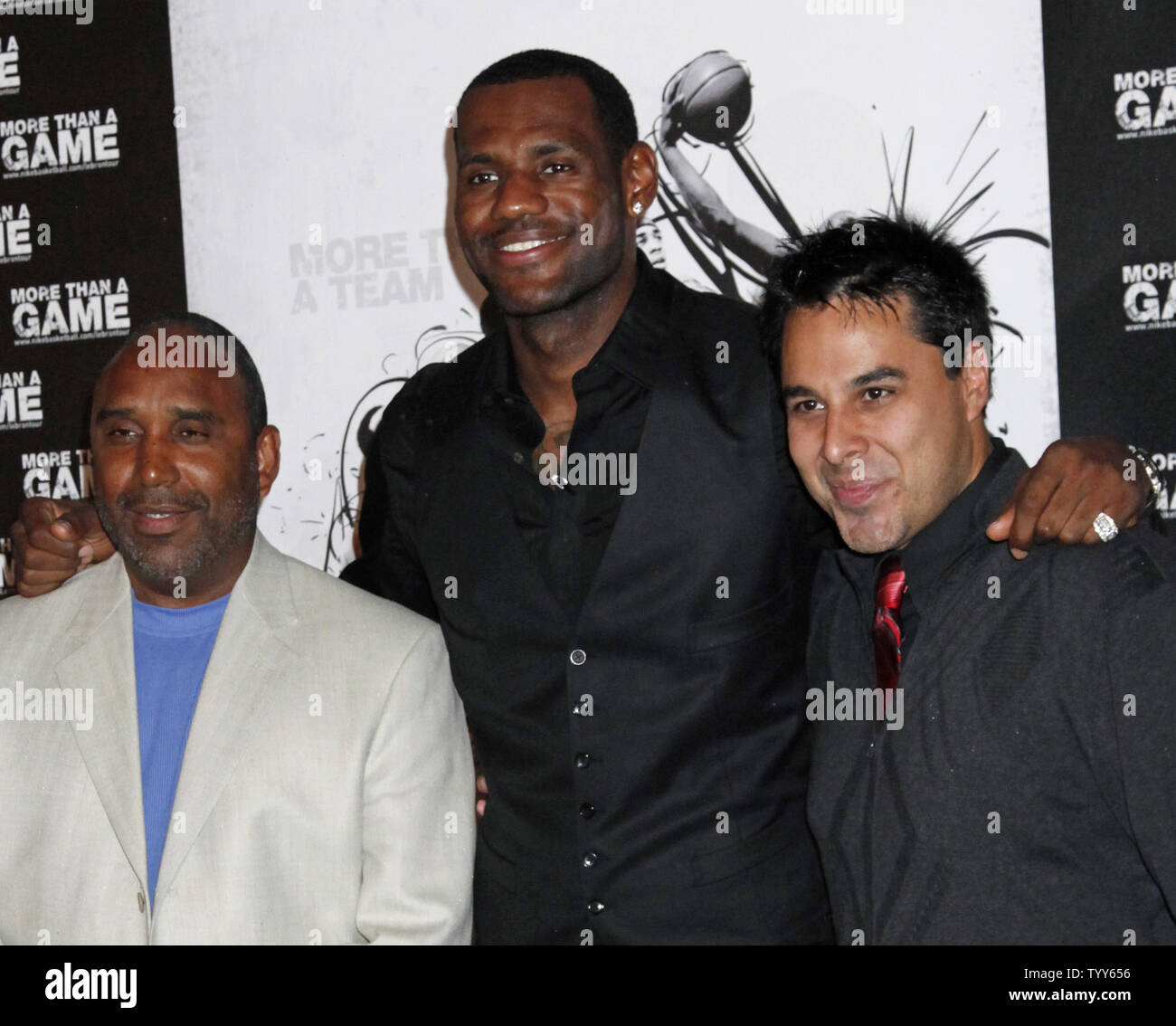 Coach Dru Joyce L NBA star LeBron James C and director