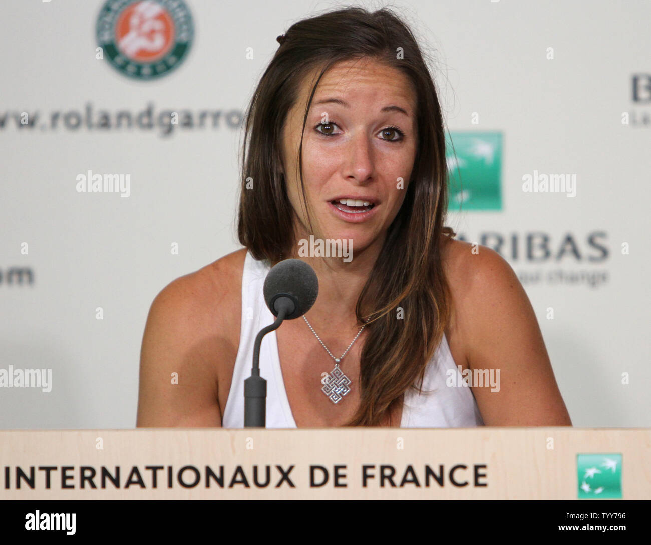 Camille Pin of France addresses the press after playing the final match of  her career at Roland Garros in Paris on May 28, 2010. Pin and partner  Mathilde Johansson were beaten by