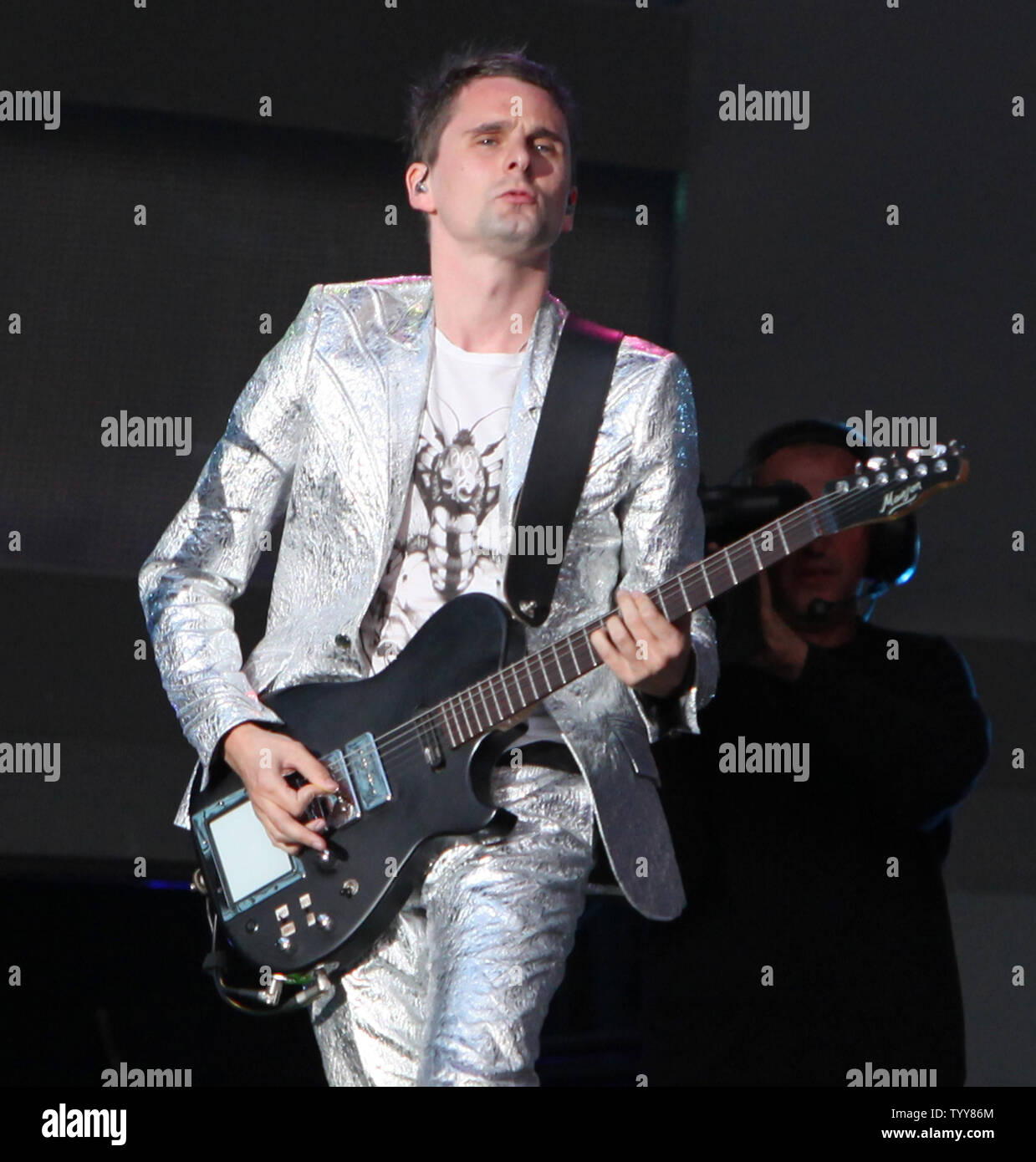 Lead singer and guitarist Matthew Bellamy performs with his group Muse at the Stade de France near Paris on June 11, 2010.   UPI/David Silpa Stock Photo