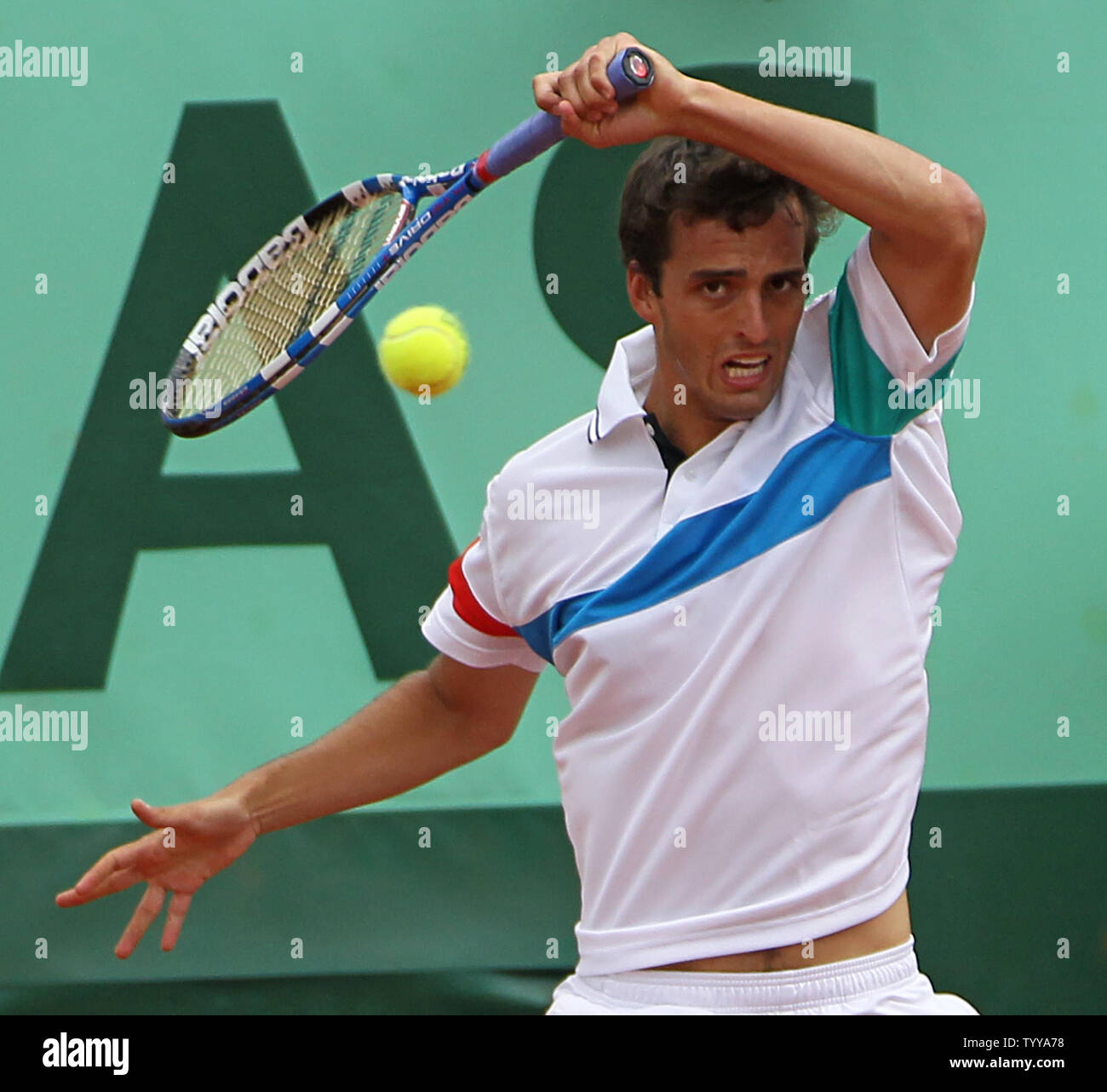 Spaniard Alberto Ramos Hits A Shot During His French Open Mens Second Round Match Against Robin Soderling Of Sweden At Roland Garros In Paris On May 26 11 Soderling Defeated Ramos 6 3