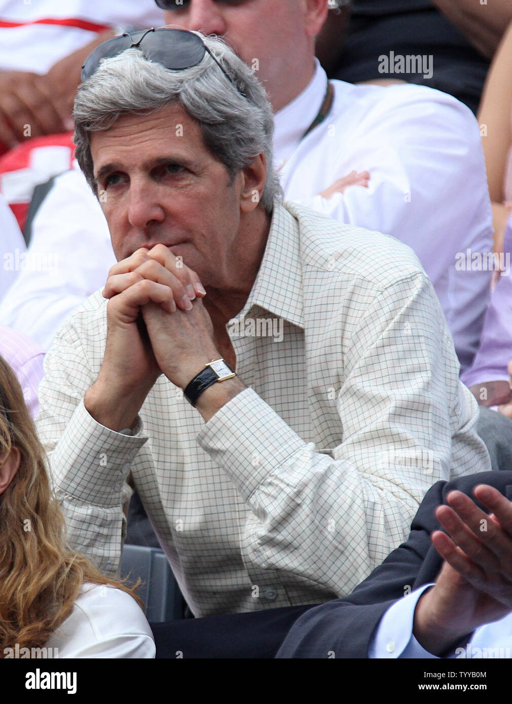 US Senator John Kerry watches the French Open mens final match between Spaniard Rafael Nadal and Roger Federer of Switzerland at Roland Garros in Paris on June 5, 2011