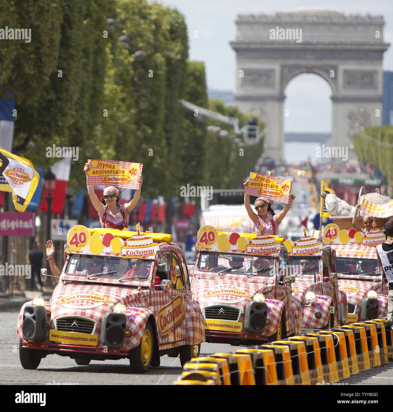 A publicity caravan drives along the Champs-Elysees before the arrival of the riders during the final stage of the Tour de France in Paris on July 24, 2011.  Cadel Evans won the event for the first time, becoming the first Australian to do so.   UPI/David Silpa Stock Photo