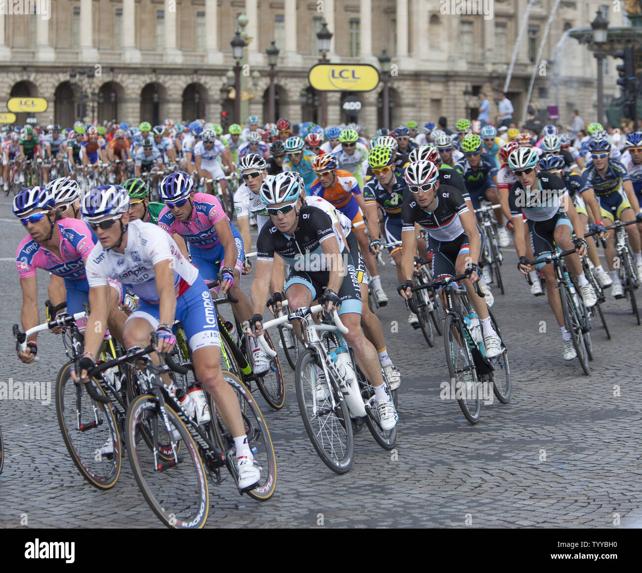 Competitors ride through the Place de la Concorde during the final stage of the Tour de France in Paris on July 24, 2011.  Cadel Evans won the event for the first time, becoming the first Australian to do so.   UPI/David Silpa Stock Photo