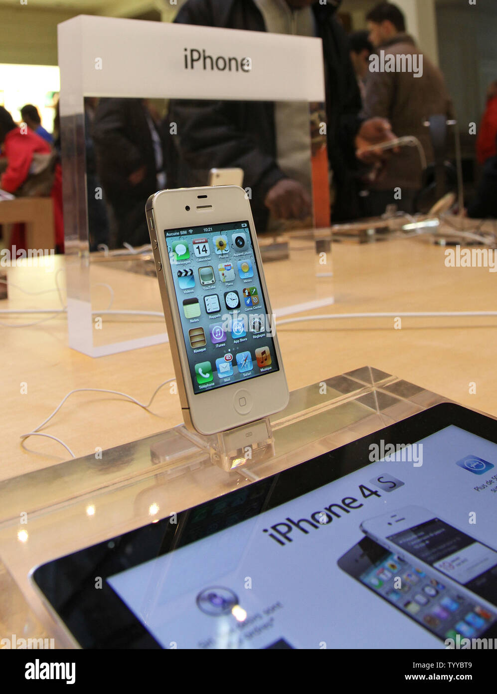 The new iPhone 4S is seen in the Apple Store near Place de l'Opera during  the phone's release today in Paris on October 14, 2011. The iPhone 4S went  on sale at