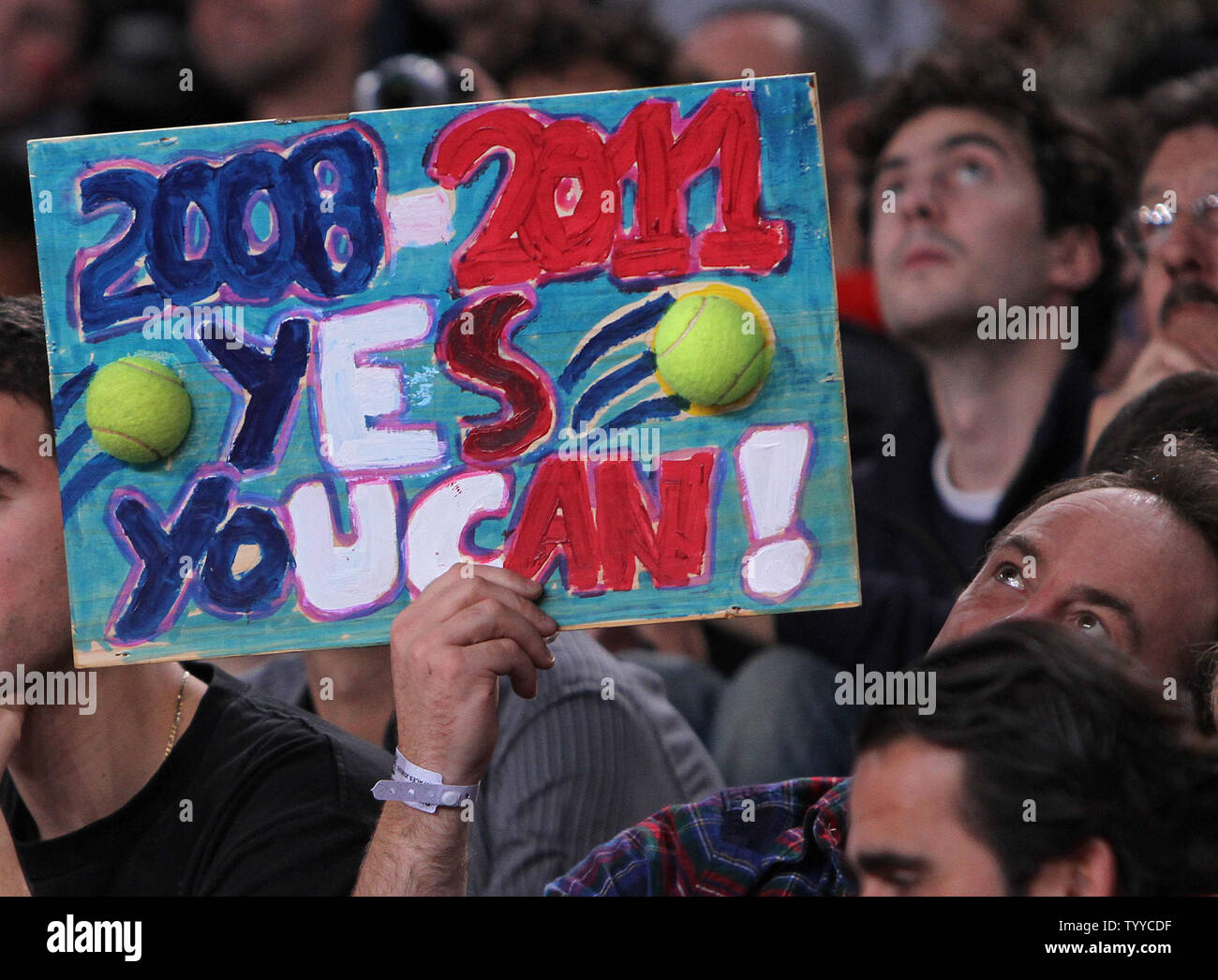 A fan holds a sign supporting Frenchman Jo-Wilfried Tsonga during the BNP Paribas Masters final match between Roger Federer of Switzerland and Tsonga in Paris on November 13, 2011.  Federer defeated Tsonga 6-1, 7-6 (3) to win the tournament for the first time in his career.   UPI/David Silpa Stock Photo