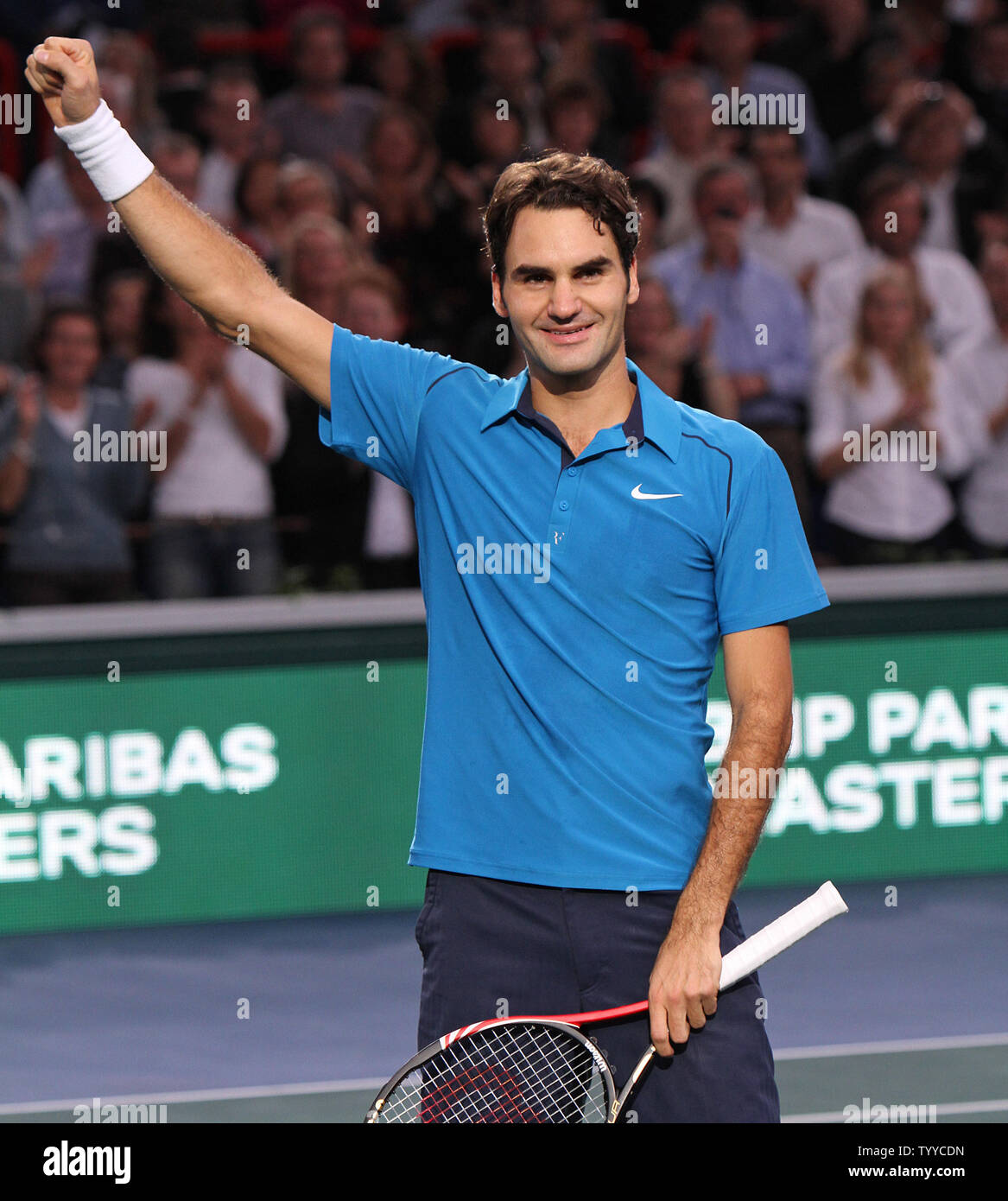 Roger Federer of Switzerland celebrates after defeating Frenchman