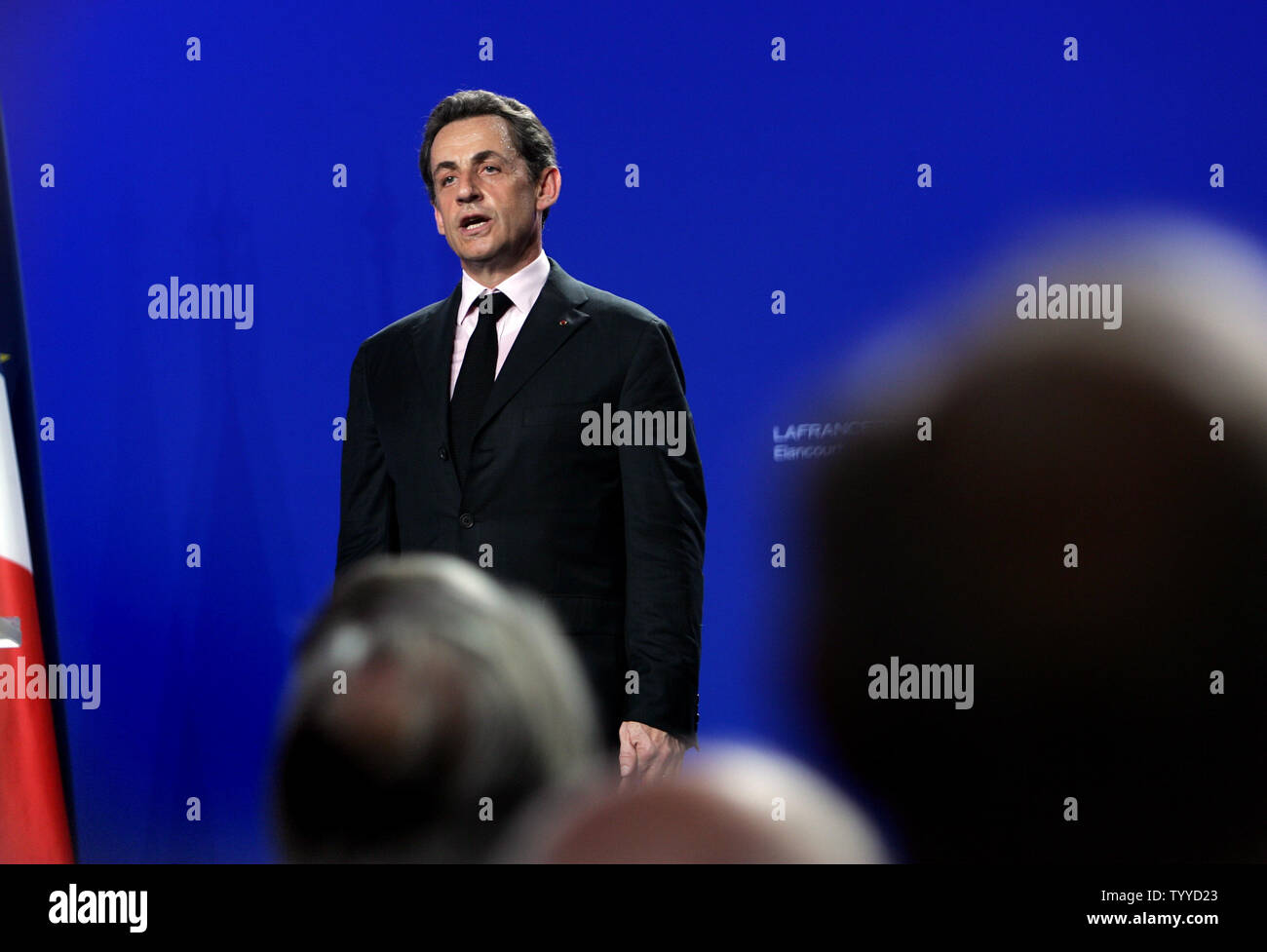 French President Nicolas Sarkozy campaigns at a public meeting on March 28, 2012 in Elancourt, near Paris, France. Polls showed that the conservative candidate has caught up with his Socialist challenger in the first round of a presidential election next month. UPI/Eco Clement Stock Photo